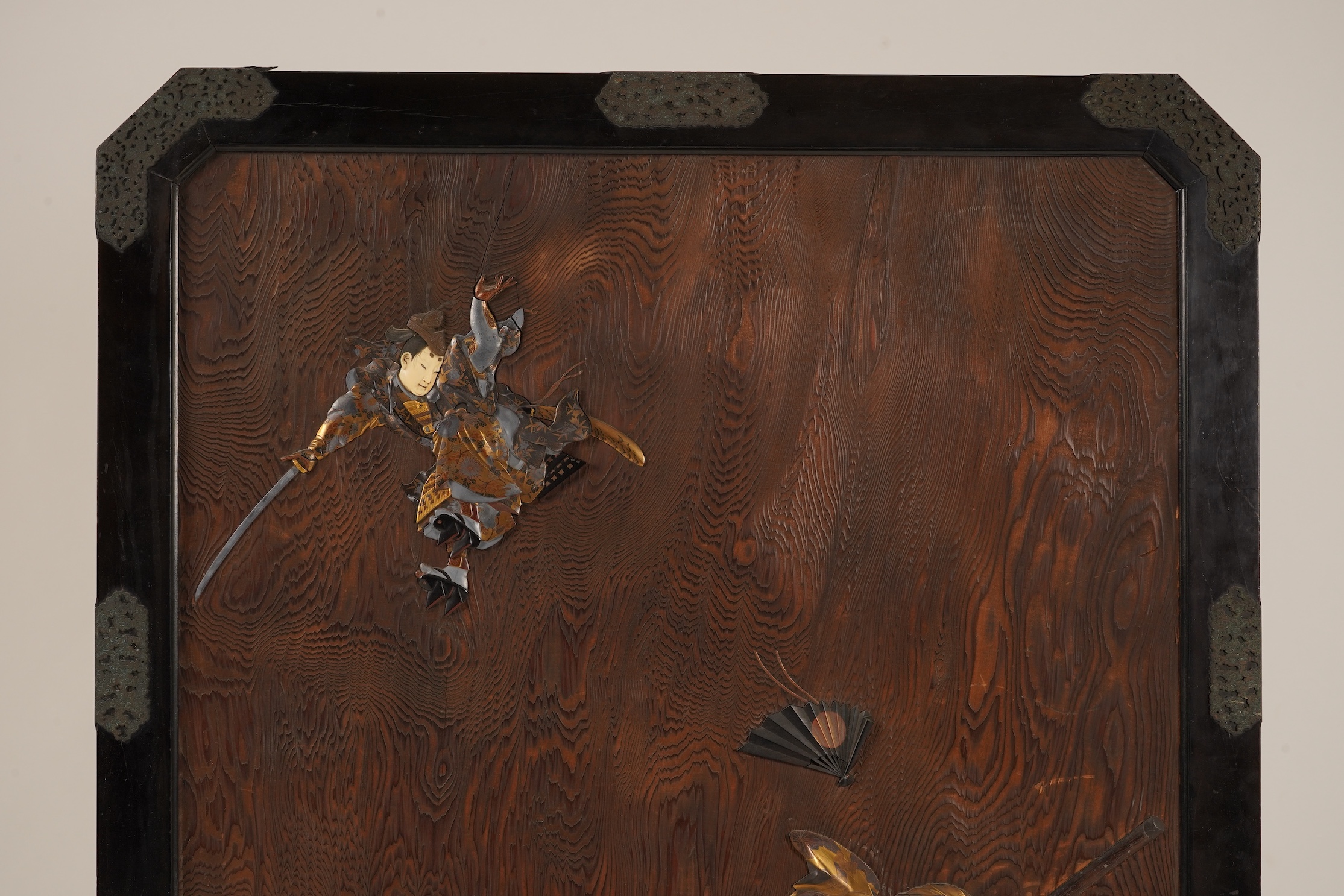 A Japanese inlaid persimmon wood tsuitate screen panel, Meiji period, possibly Tokyo School